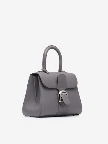 Delvaux brand handbag in grey leather. Press stud openin…