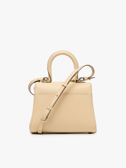 Delvaux - Make a statement with our Brillant Trench.