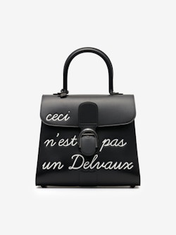 Delvaux Mini L'Humour Brillant Bag Charm-Black Leather Type: Calfskin  Hardware: Silver Tone Condition: 9.9 Comes With: dust bag Size…